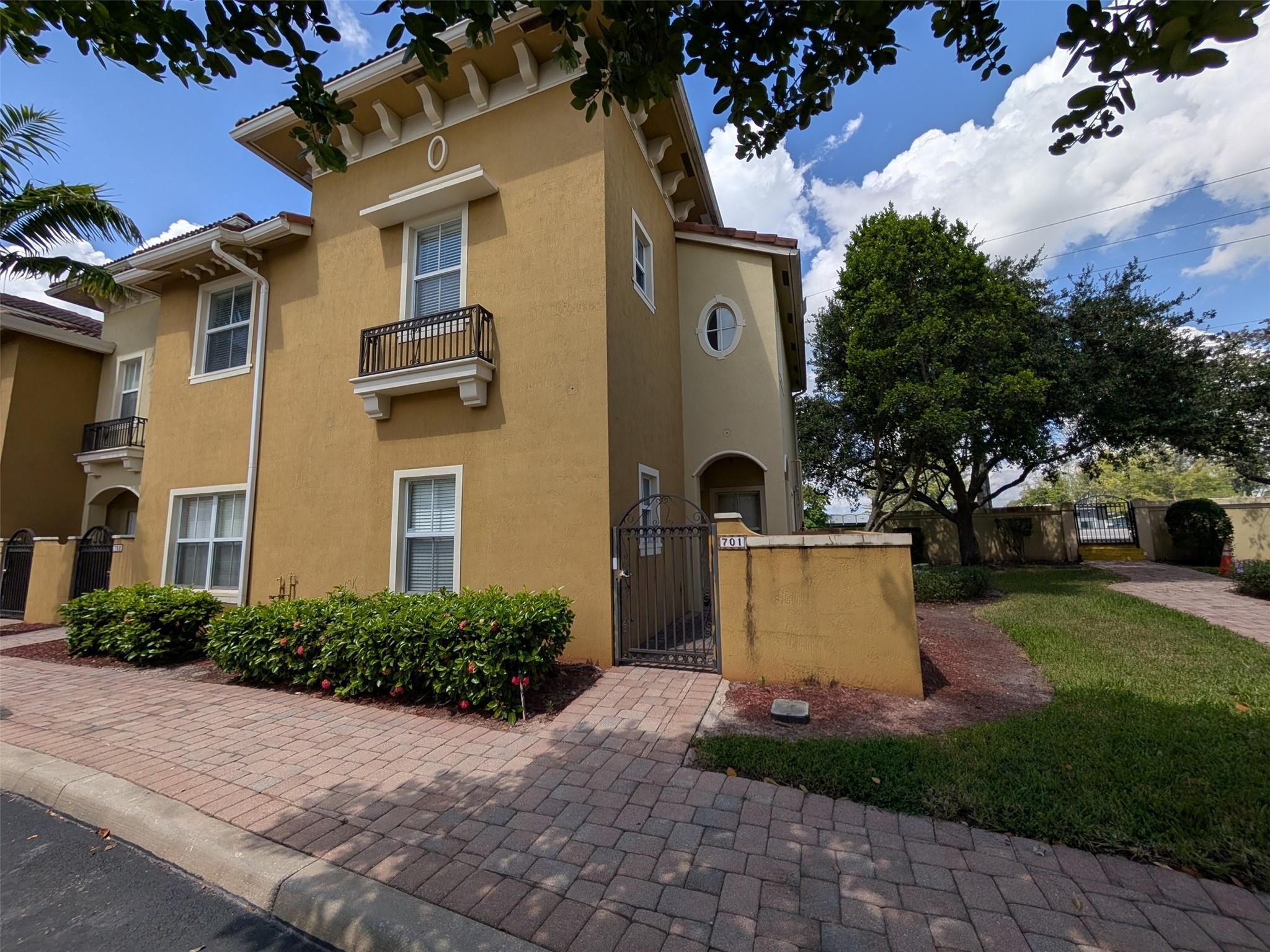 Specious three bedrooms and three full bathrooms, corner town house, One bedroom and one full bathroom first floor. Upgraded kitchen cabinets with stainless steel appliances. Brand new vinyl flooring second floor and stairs. Washer and dryer located in the second floor for your convenience. Fenced front patio and backyard and Gated community. Near shopping, and highways