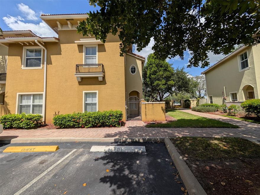 Specious three bedrooms and three full bathrooms, corner town house, One bedroom and one full bathroom first floor. Upgraded kitchen cabinets with stainless steel appliances. Brand new vinyl flooring second floor and stairs. Washer and dryer located in the second floor for your convenience. Fenced front patio and backyard. Gated community. Near shopping, and highways