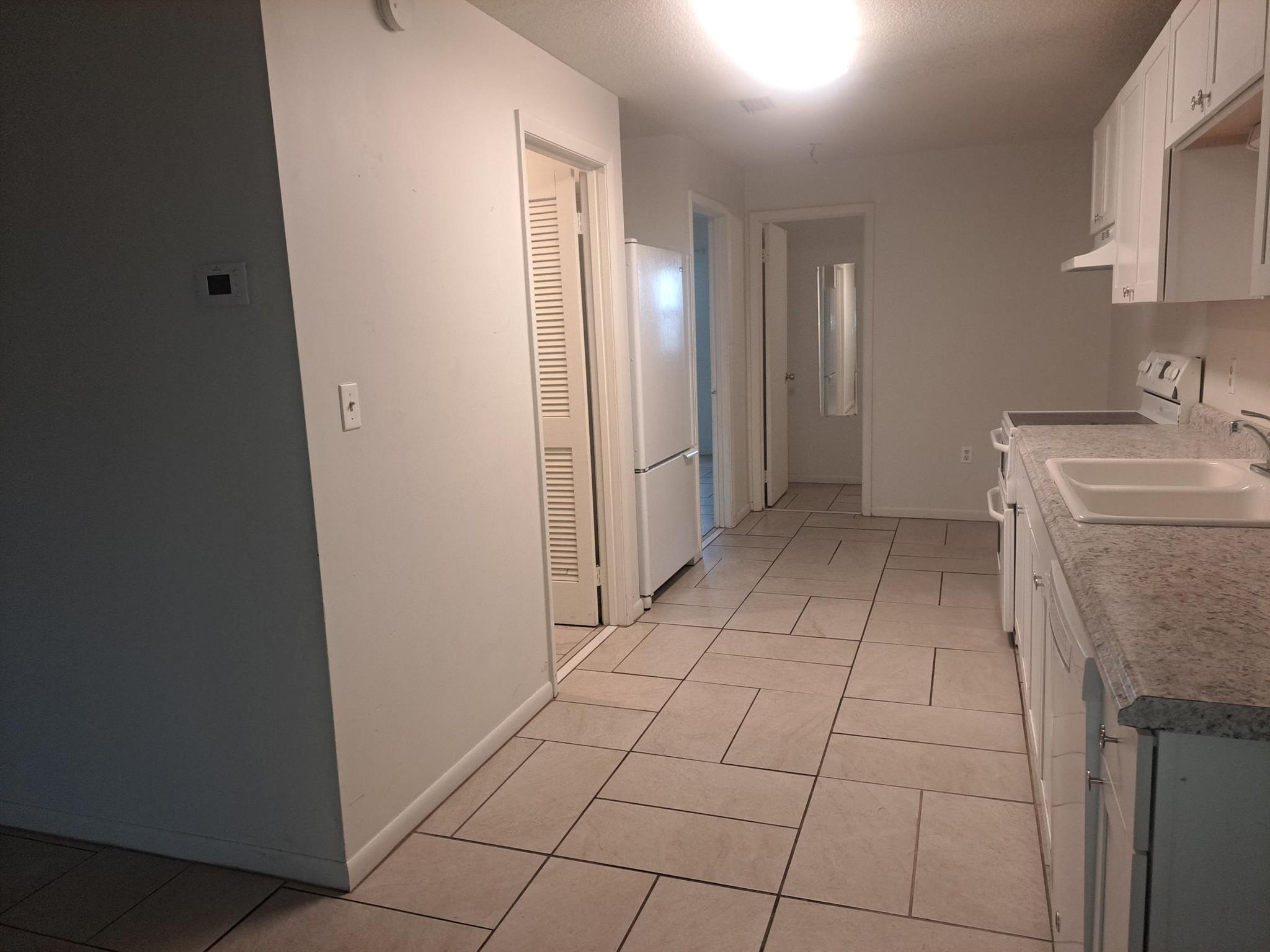 ISLAND HOUSE CONDOMINIUM - Residential Lease