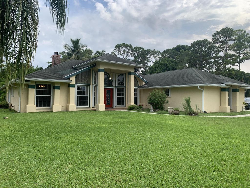 Photo of 16746 E Grand National Drive, The Acreage, FL 33470 (MLS # R11011603)