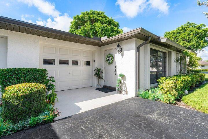 Photo of 4948 Equestrian Circle #B, Boynton Beach, FL 33436 (MLS # B26086645)