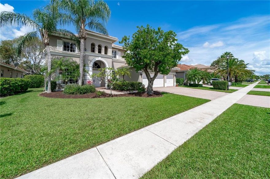 WOWZER!! 5/3 3 CAR GARAGE POOL HOME IN WELLINGTON SHORES  GATED COMMUNITY. SPACIOUS MARLEY FLOOR PLAN. ONE BEDROOM AND BATH ON THE FIRST FLOOR. VOLUME CEILINGS, TILE ON FIRST FLOOR, WOOD CABINETS WITH GRANITE COUNTER TOPS, LARGE ISLAND IN KITCHEN AREA. FORMAL DINING AND LIVING ROOM, EAT IN KITCHEN. LARGE MASTER SUITE, MASTERBATH WITH JACUZZI TUB, LARGE WALK IN CLOSETS. ALL BEDROOMS ARE SPACIOUS WITH LOTS OF CLOSET SPACE. OPEN POOL AREA WITH COVERED PATIO. LOTS OF AMENITIES IN THE COMMUNITY, POOL, TENNIS, CLUBHOUSE. OPEN HOUSE THIS SATURDAY 04/23/2022 12-3PM