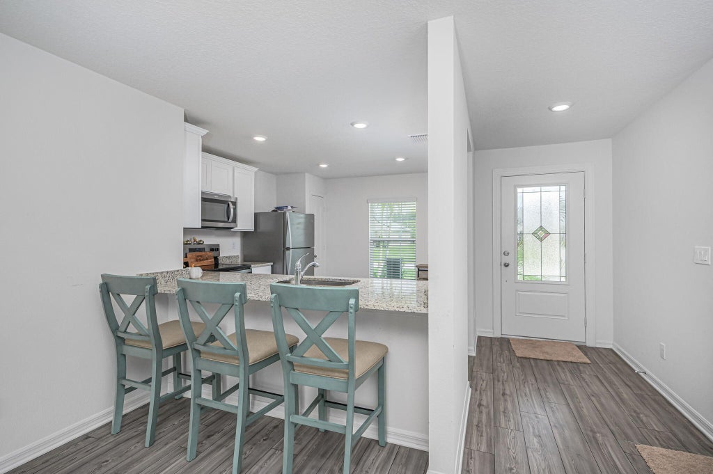 Photo of 1926 SW Beard Street, Port Saint Lucie, FL 34953 (MLS # R11052108)