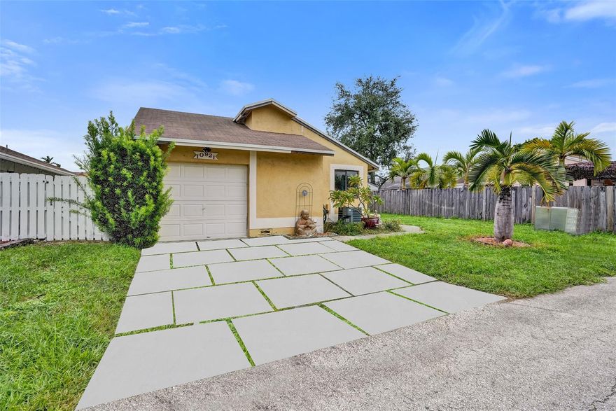 Located in Woolbridge at Pembroke Lakes South offering a very low HOA, this 3-bedroom, 2-bathroom home provides the perfect blend of comfort & convenience. Featuring abundant natural light, vaulted ceilings, tile flooring throughout, & spacious bedrooms ready for your personal touch. Both bathrooms have been beautifully renovated, adding a modern feel. Back & side yard have sprinkler system installed. Nearby shopping with retail, dining, & entertainment options. Pembroke Lakes Mall, Shops at Pembroke Gardens, & Pembroke Commons. Outdoor recreation awaits at C.B. Smith Park with lakes, trails, water slides & sports facilities. Golfers would love the proximity to Pembroke Lakes Golf Club. This neighborhood provides easy access to top-rated schools & major highways for effortless commuting.