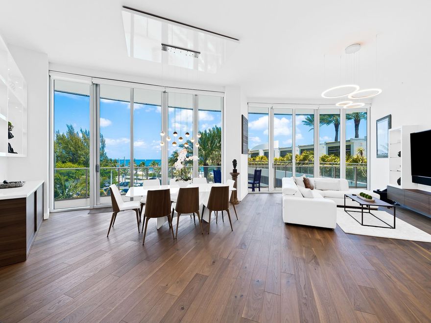 Experience unparalleled luxury and sophistication at this exquisite Paramount Residence offering 3,202 sq. ft. of living space, wall to wall ocean-facing windows, a surrounding balcony and rare 12 ft. ceilings - minted for relaxation, fun and grand entertaining - Fort Lauderdale style. One of the only Residences with direct access to the stunning Pool Deck, cabanas & BBQ area, just a few feet away! 4 spacious en suite bedrooms, plus an additional half bath, ensure comfort and privacy. High-end finishes and state-of-the-art fixtures welcome you from the direct access elevator. Residents can indulge in many upscale amenities: Truluck's restaurant, sauna, yoga studio, guest rental suites, a fully equipped gym with Peloton area, infinity Olympic-sized pool with a hot tub, and beach service.