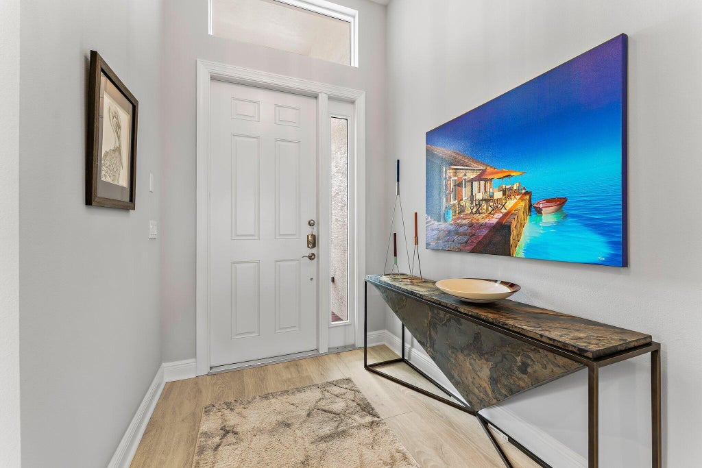 Photo of 9306 SW Miracoli Way, Port Saint Lucie, FL 34987 (MLS # R11019307)