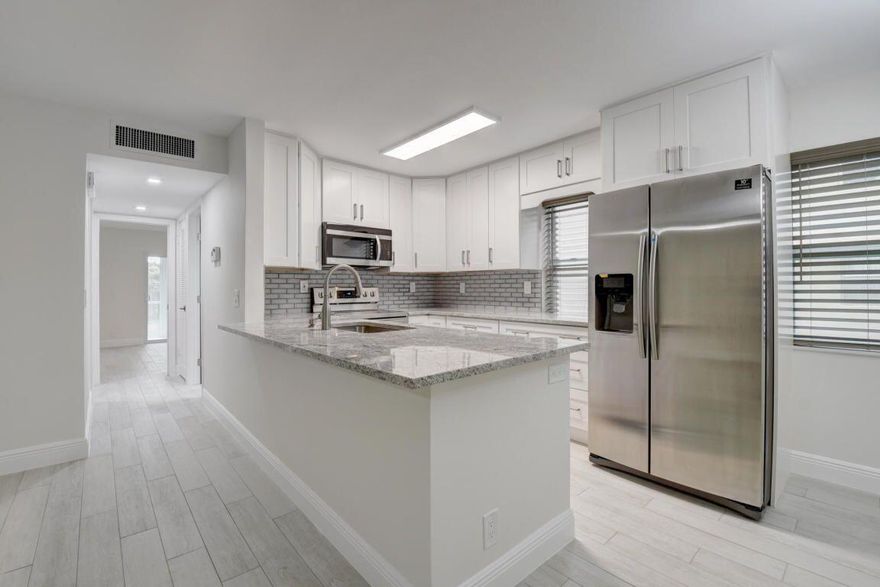 Ground floor right near entrance, impact windows, porcelain tile, All fully permitted, new electrical, New AC, new water tank, garden view, screened patio.
Under Contruction - will be completed as shown in photos. 2 bedroom 2 bath completely remodeled.