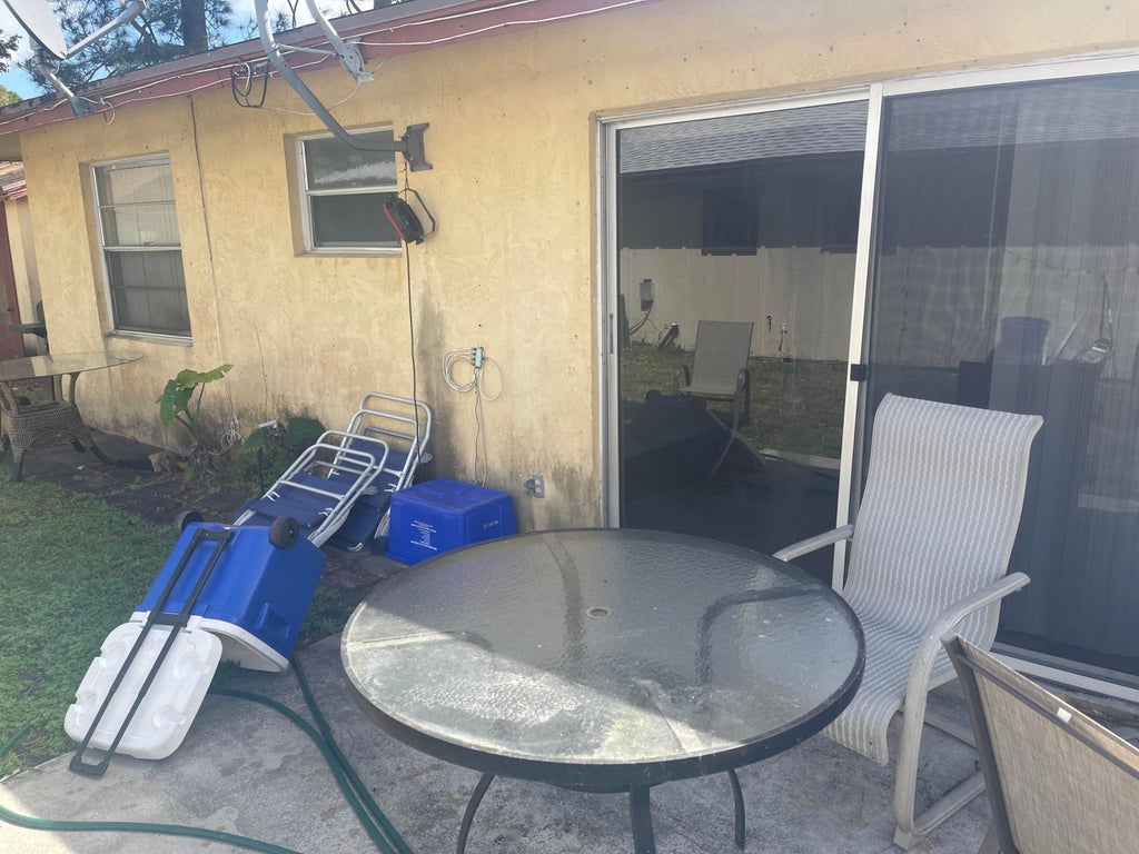 Photo of 9144 W HIGHLAND PINES Boulevard #9144, Palm Beach Gardens, FL 33418 (MLS # B26082054)