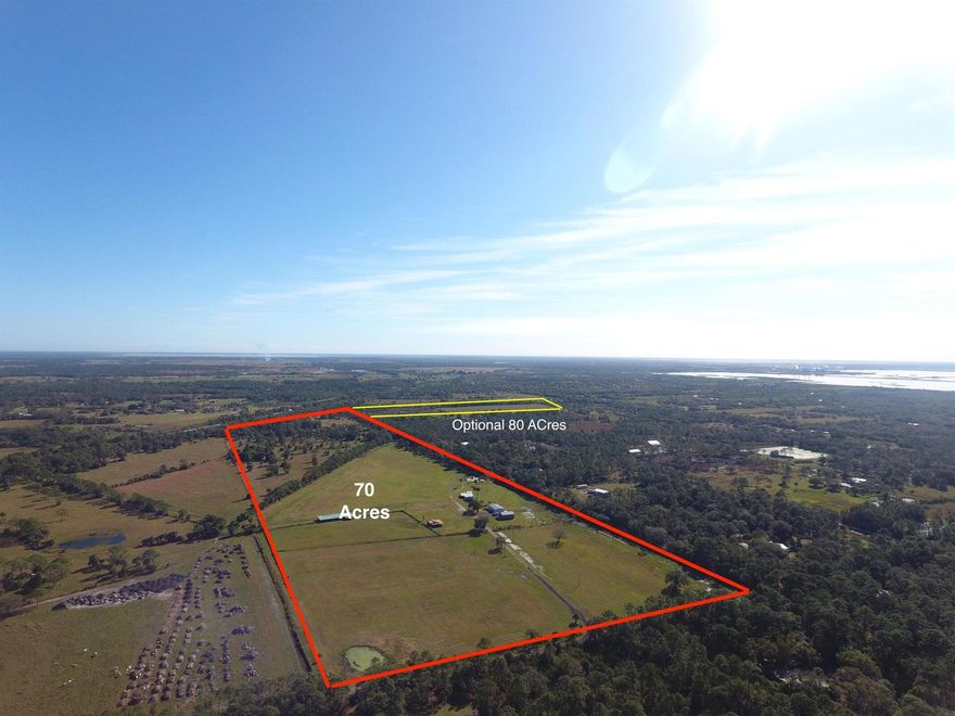 Rare opportunity to own 69 acres near the fast growing City of Indiantown. Property is High and Dry within Flood Zone X. Brand New 1595 sq ft, 3 bedrooms, 2 bath Manufactured Home with new appliances, water filtration system, new septic, and drainfield. Home has large master bathroom and walk in laundry room. New Metal Garage 30' x 39' with spray foam insulated ceiling for storing all your equipment. Three older covered barns onsite. New fenced for horse pasture. Zoning is AR-5A which allows properties to be subdivided. Check with county for more details.. The 69 acres has 3 wells, 3 electric meters -1 is a new 400 AMP panel + 2 with 150 Amp. Adjacent 80 acres also available (MLS RX-11090985).