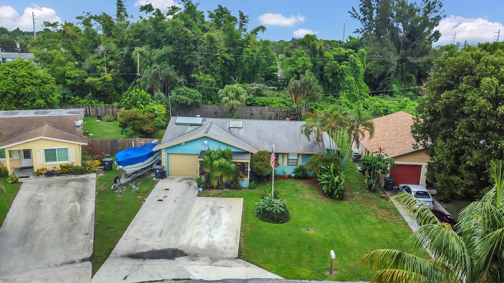 Photo of 3667 Brooklyn Lane, Lake Worth, FL 33461 (MLS # R11124099)