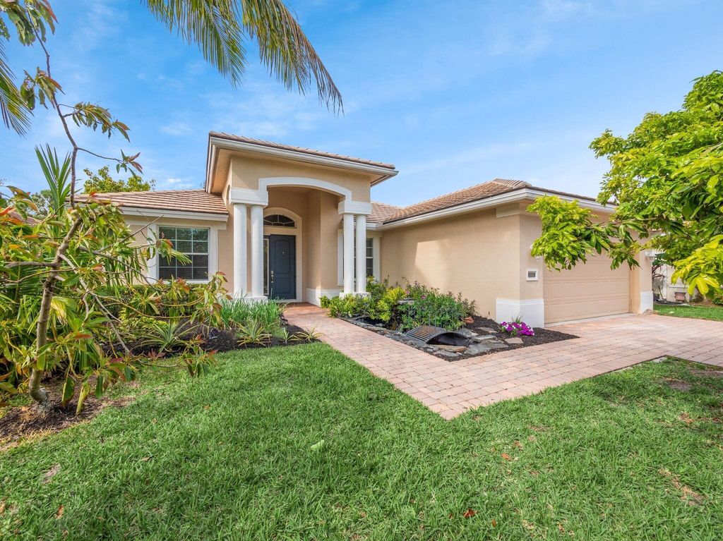 Photo of 2020 NW Windemere Drive, Jensen Beach, FL 34957 (MLS # R11048002)