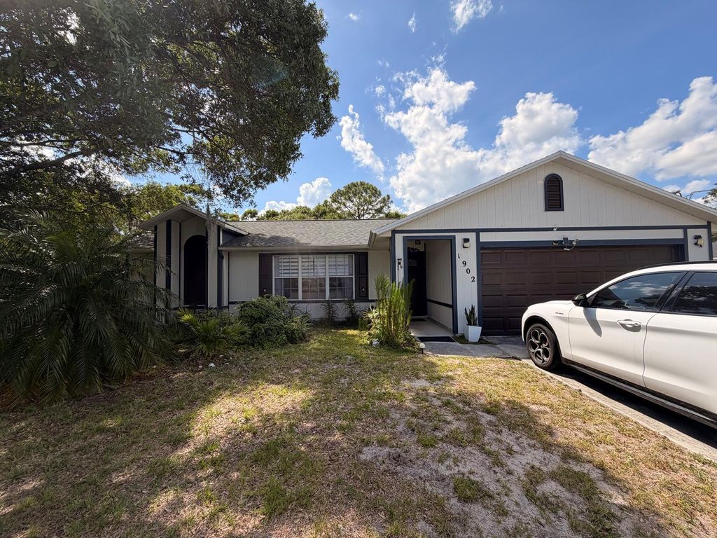 Photo of 1902 SW Aladdin Street, Port Saint Lucie, FL 34953 (MLS # B26021156)