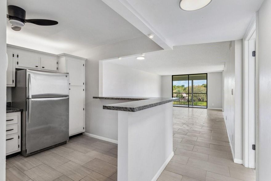 3rd floor CORNER unit over looking the 12th hole and water! 2 Bed/2 Baths and ready for occupancy. Located in the beautiful Deer Creek Golf community with NO mandatory golf membership required. With over 1,000 sq ft this split floor plan features a generous living space, spacious bedrooms each with walk-in closet. You will love the screened in balcony with direct & sweeping views of the golf course. Residents enjoy access to the Clubhouse, Deer Creek Grill, Pro shop, heated pool, new fitness center, sauna, tennis/pickleball courts, a Golf Practice Area, and so much more. Deer Creek’s championship golf course is pay as you play. Close to shopping, major highways, parks and just about 4 miles to Deerfield Beach. No Pets. No washer and dryer in the unit.