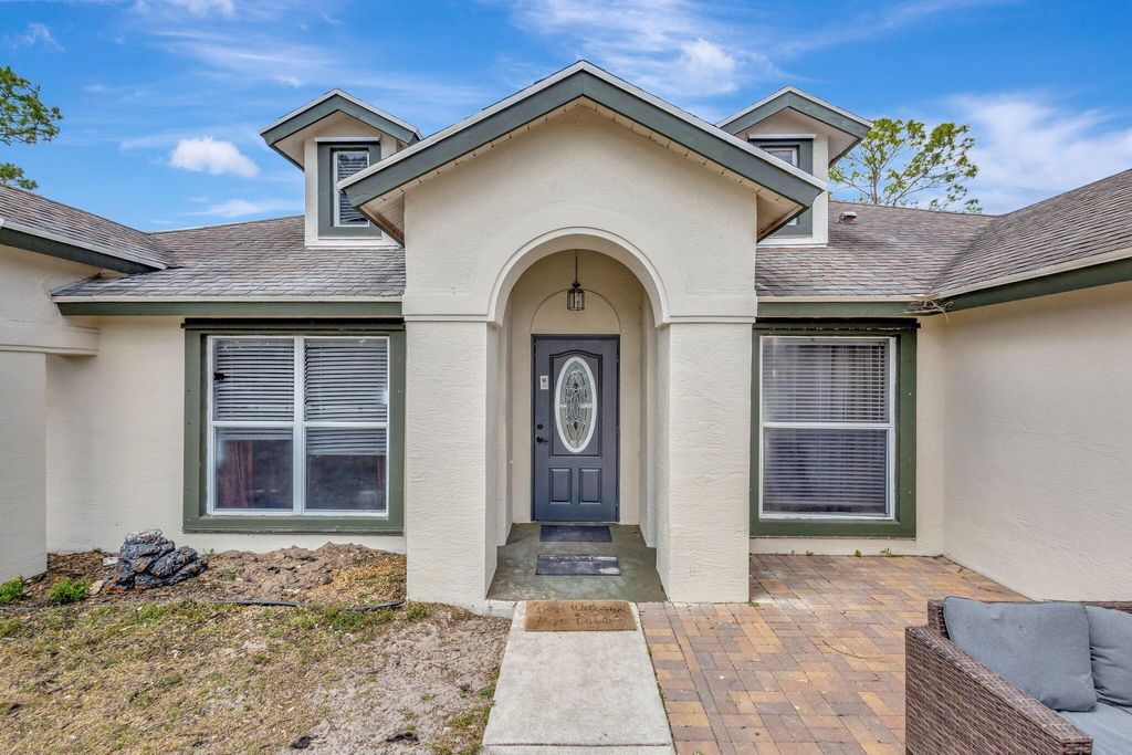 Photo of 14311 86th Road N, Loxahatchee, FL 33470 (MLS # R11084409)