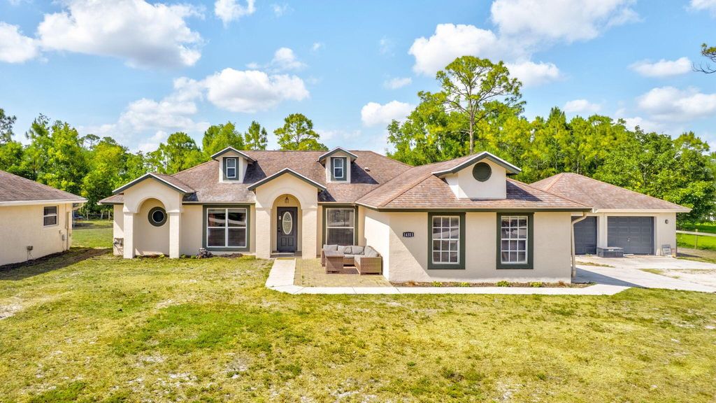 Photo of 14311 86th Road N, Loxahatchee, FL 33470 (MLS # R11084409)