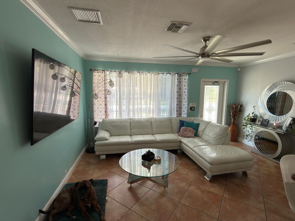 Photo of 129 Cayman Dr, Palm Springs, FL 33461 (MLS # B26000678)