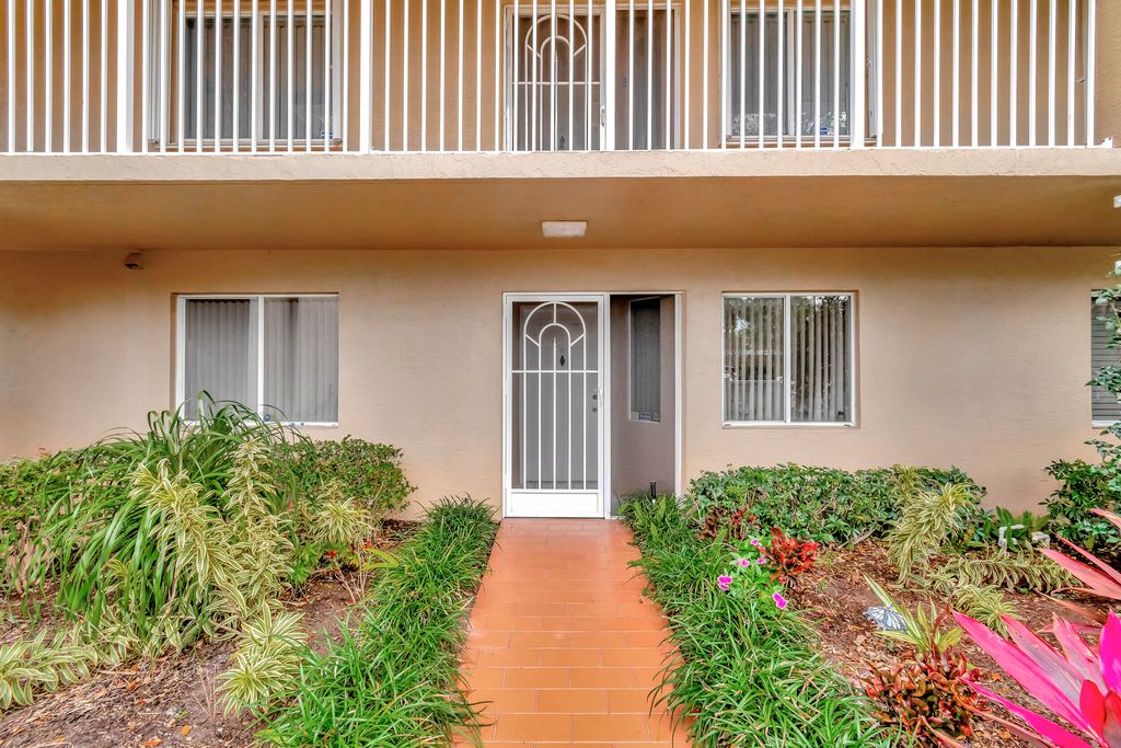 Photo of 5876 Regal Glen Drive #101, Boynton Beach, FL 33437 (MLS # R10962093)