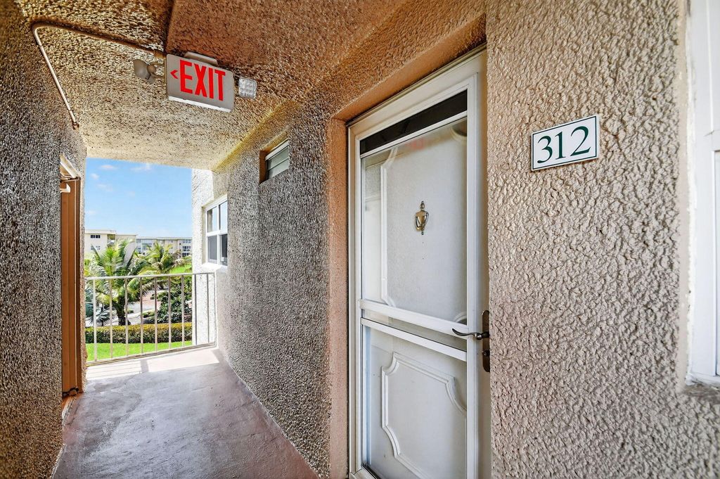 Photo of 2615 NE 1st Court #312, Boynton Beach, FL 33435 (MLS # B26001858)