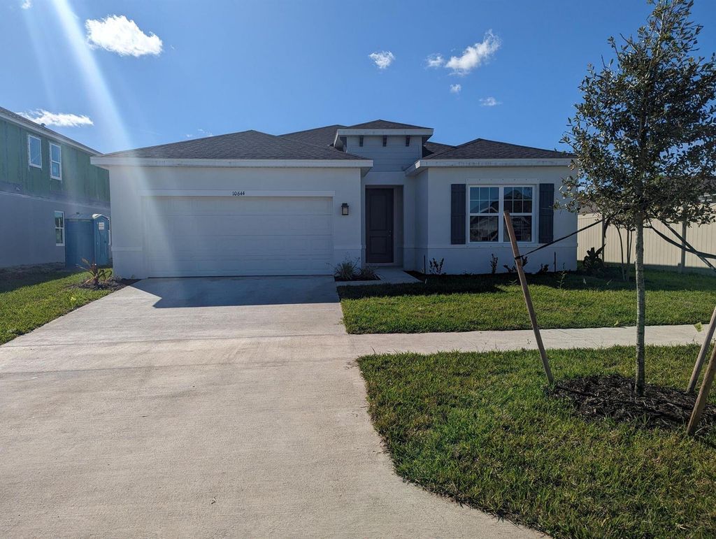 Photo of 10644 SW Vasari Way, Port St Lucie, FL 34987 (MLS # R10954876)