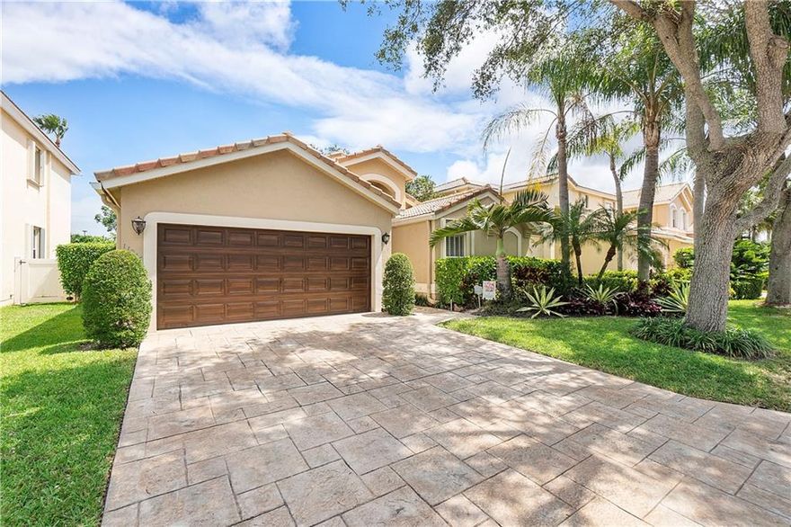Great Scott!! Florida living at its best in this move in ready 3/2 in the sought after gated development called Sanctuary. Large, bright and open living area**Upgraded kitchen with granite countertops** Newer SS applicances**extensive use of tile through-out living area**wood floors in bedrooms**plantation shutters**upgraded baths** beautiful totally private pool area with cover area for outdoor dining**accordion shutters**Low HOA, right off of the Sawgrass expressway**excellent school district** convenient to shopping centers and community parks**