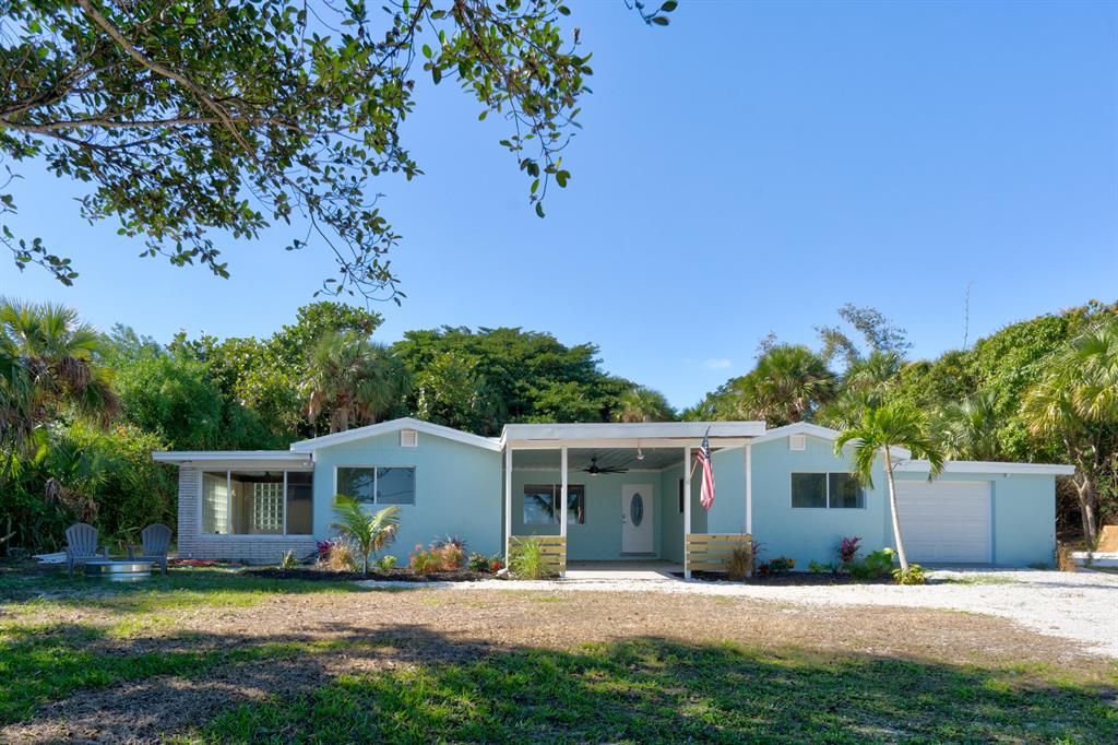 Photo of 11999 S Indian River S Drive, Jensen Beach, FL 34957 (MLS # R10758328)