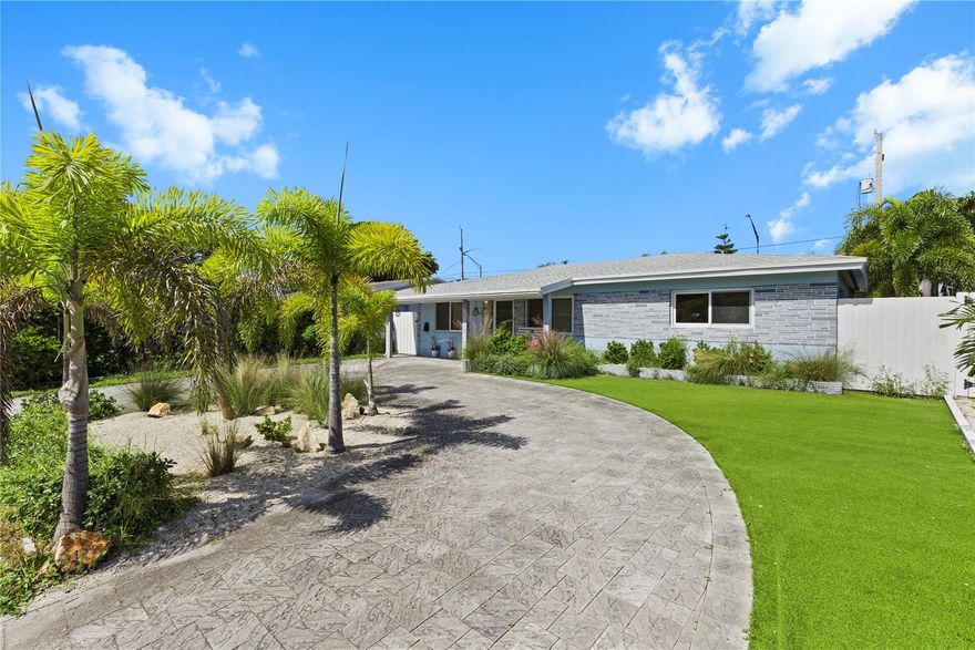 Your private tropical getaway awaits! This updated 3BR/2BA with a fully fenced and completely private back yard blends easy Florida living with stylish updates and a laid-back coastal vibe. The property is located in North Andrews Gardens, just East of I-95 - a ten minute drive to the beach and Los Olas Boulevard and a five minute drive to Wilton Manors.  The home offers all of the proximity to local attractions that a downtown condo provides, but with more square footage and with a private resort-style and  completely fenced and private yard. And there is no monthly assessment and no HOA! The interior of the home is open-spaced, light filled and beautifully updated giving the home's interior a chic beach cottage feel.
