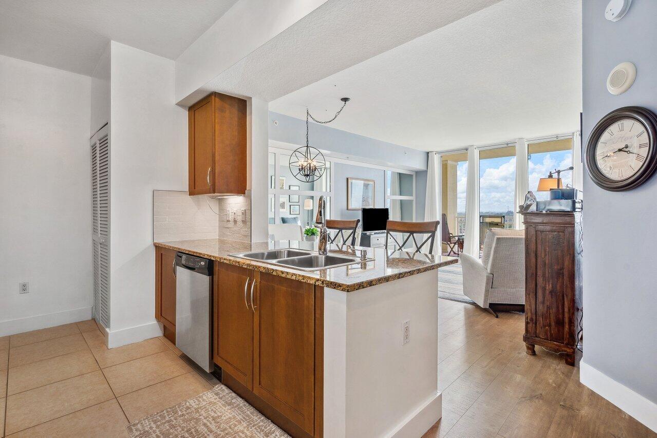 Stylish Bright and spacious 1 Bedroom 1 Bathroom west facing unit with upgraded flooring throughout.New front load washer and dryer. New Refrigerator and Microwave Enjoy resort style living , less than 1 mile to the beach!.The unit is immaculate and well taken care of! Granite countertop Stainless Steel appliances. Amenities include gym with new cardio equipment, sauna/steam room, social room, pool table, table tennis,Valet Services, concierge, 2 large outdoor pools with full sun exposure! Pet friendly building with doggy bathing/grooming room, valet parking for guests, 24 hour night security concierge and onsite management office. Walking distance to restaurants, bars, and Boynton Beach Marina. 15 min drive to downtown Delray