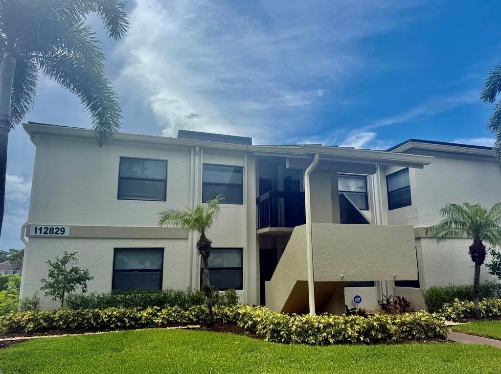 Photo of 12829 Briarlake Drive #201, Palm Beach Gardens, FL 33418 (MLS # R11101982)