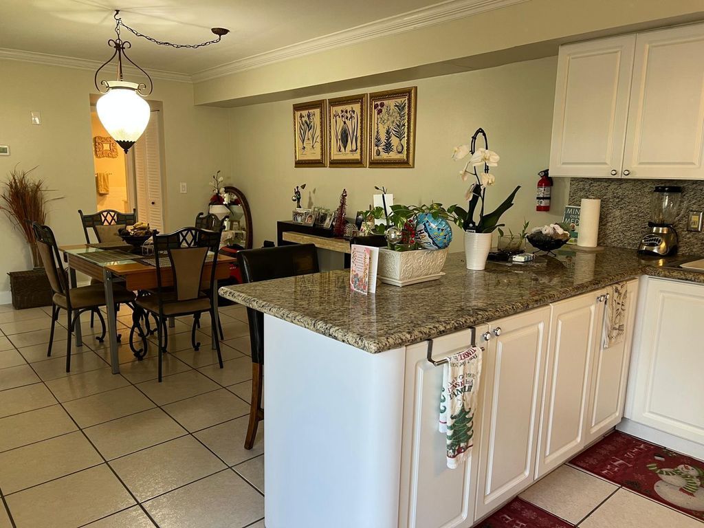 Photo of 6322 Seven Springs Boulevard #B, Greenacres, FL 33463 (MLS # R11150814)