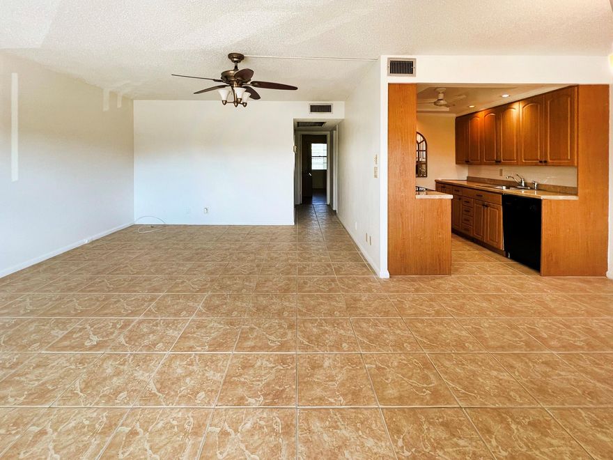 MOVE RIGHT IN!! THIS BEAUTIFUL TWO BEDROOM, 1.5 BATH FEATURES A BEAUTIFUL WATERVIEW FROM THE ENCLOSED PATIO!! THE UPDATED KITCHEN INCLUDES WOOD CABINETS, RECESSED LIGHTING, TILE BACKSPLASH AND A BRAND NEW REFRIGERATOR! A/C: 2 YEARS OLD, HWH: 3 YEARS OLD! TILE FLOORS IN LIVING AREA, LAMINATE IN BEDROOMS! UPDATED HALF BATH AND NEW VANITY IN PRIMARY BATHROOM! FRESHLY PAINTED LIVING AREA!! AND THEN THERE IS THE 5 STAR CLUBHOUSE W/STATE OF THE ART GYM, CLUBS AND CLASSES OF ALL SORTS, DANCING, SINGING, BILLIARDS, PICKLEBALL, TENNIS, SHUFFLEBOARD, 18 SWIMMING POOLS, KARAOKE, PAINTING, & SCUPTING! YOU NAME IT AND IT'S HERE AT CENTURY VILLAGE! GATED COMMUNITY WITH 24 HR PRIVATE SECURITY! JUST 3.5 MILES TO GORGEOUS DEERFIELD BEACH! CLOSE TO ALL MAJOR HWYS AND GREAT EATERIES! ASSOC. CLAIMS 55+