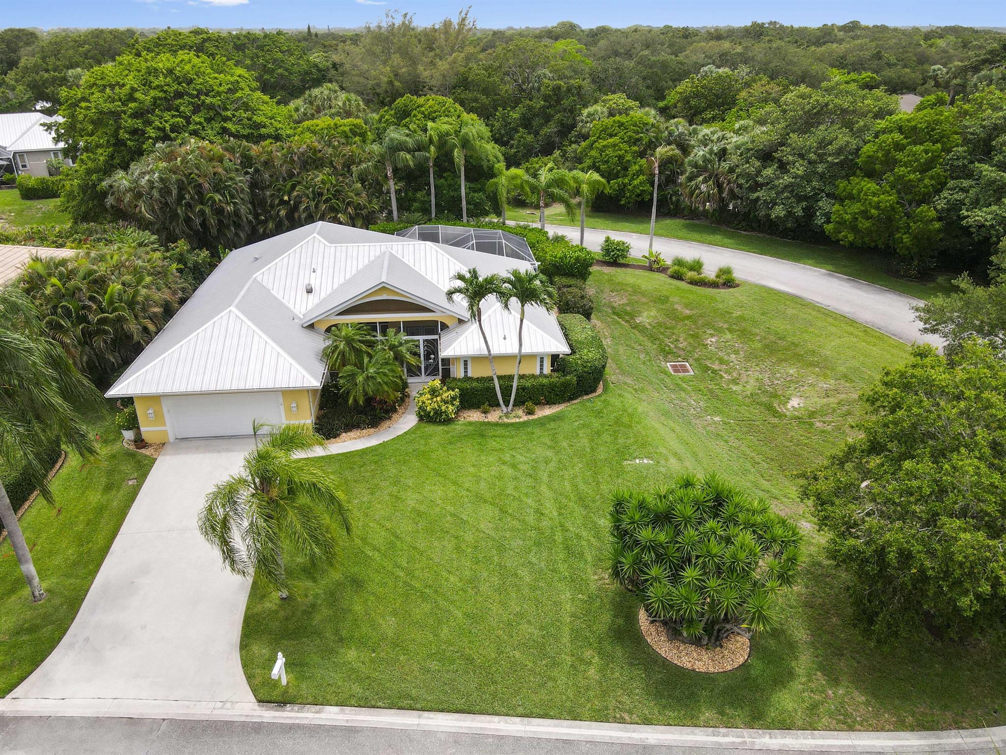 Welcome to The Reef - a gated coastal community offering privacy, comfort, and natural beauty! This spacious 1-story home sits on a desirable corner lot spanning 0.2732 acres and features 2,432 square feet of well-designed living space. With 4 bedrooms and 3 baths, there's plenty of room for family and guests.Enjoy a blend of tile flooring in common areas and carpeted bedrooms for added warmth and comfort. The kitchen comes equipped with appliances, perfect for daily living and entertaining. You can simply step outside to your screened patio with a pool, an ideal spot to relax and unwind.
