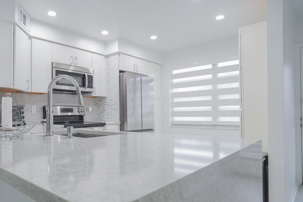 Photo of 3201 Portofino Point #F1, Coconut Creek, FL 33066 (MLS # F10540132)