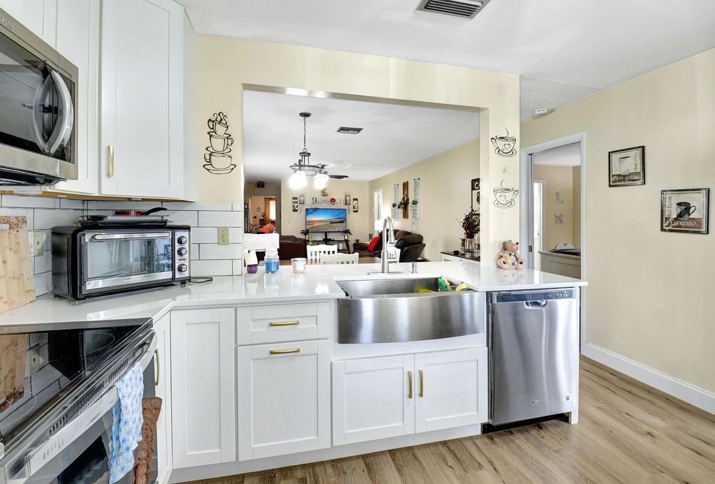 Photo of 1751 Palmland Drive, Boynton Beach, FL 33436 (MLS # R10953473)