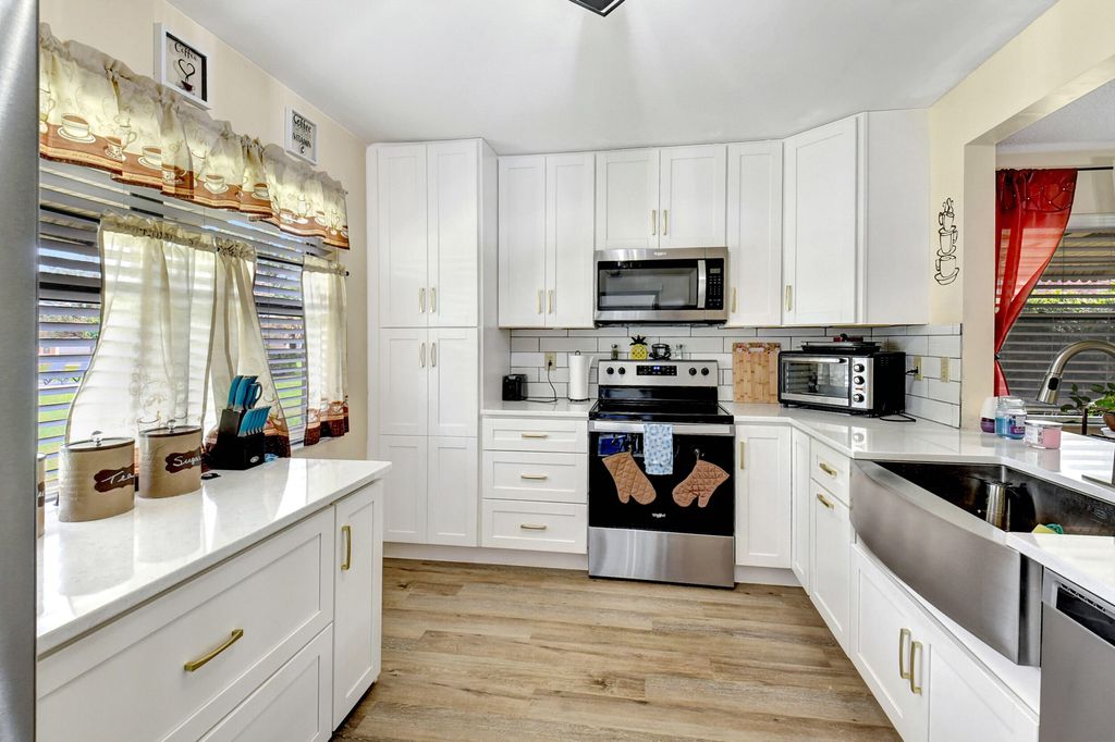 Photo of 1751 Palmland Drive, Boynton Beach, FL 33436 (MLS # R10953473)