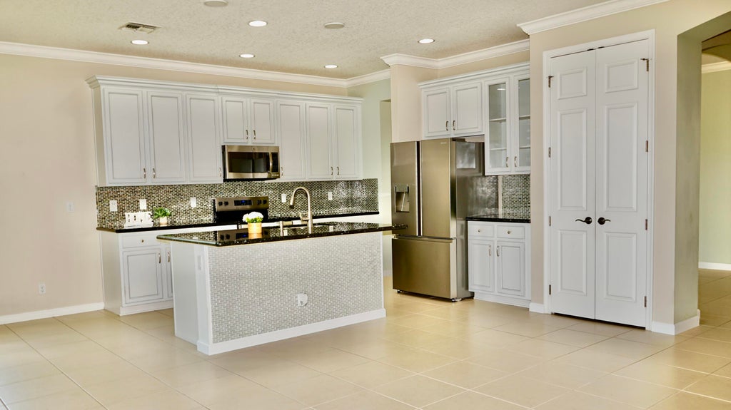 Photo of 11322 SW Barton Way, Port Saint Lucie, FL 34987 (MLS # R11083557)