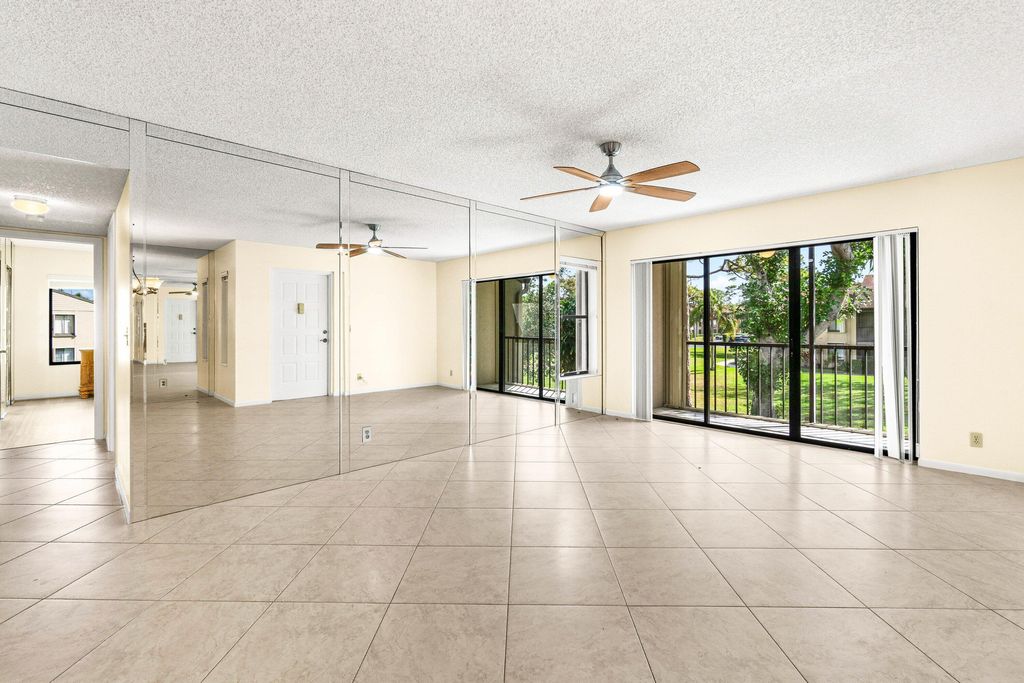 Photo of 721 Sunny Pine Way #B2, Greenacres, FL 33415 (MLS # B26001975)