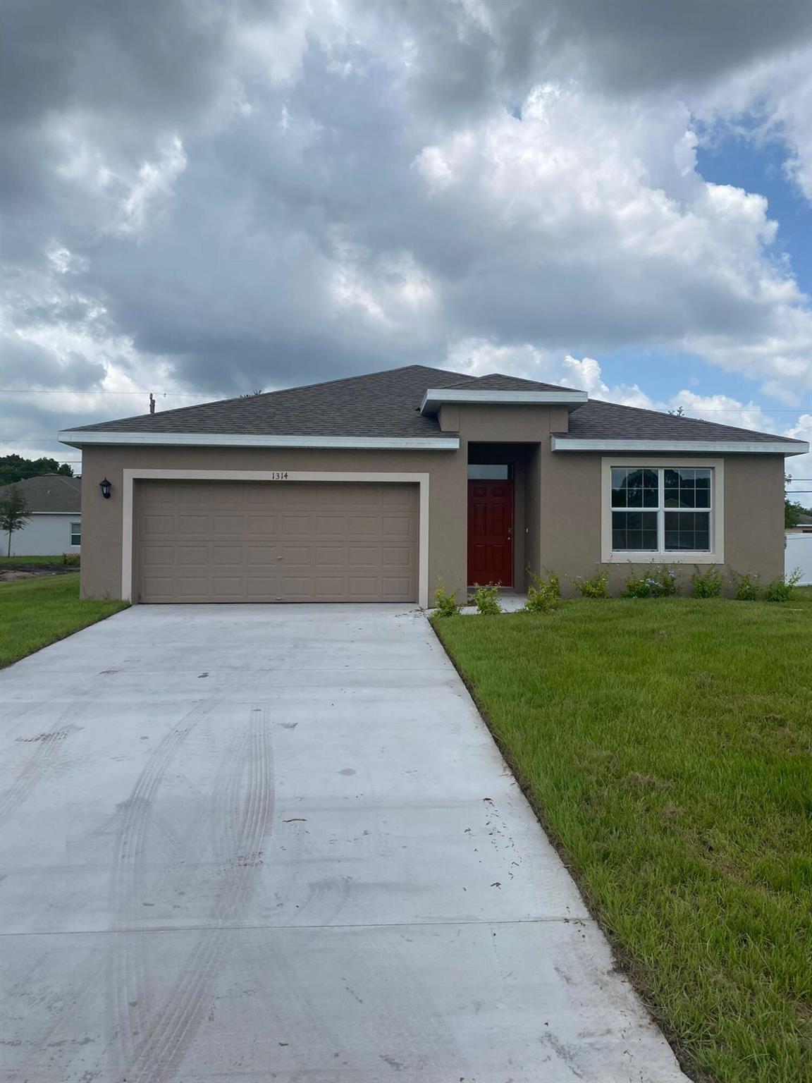 Brand new 4 Bedroom, 2 bath, 2 car garage . Open floor plan with large kitchen island and walk in pantry. Primary bedroom easily fits king size furniture and more, with an oversized walk-in closet and large linen closet. Tile everywhere except the bedrooms. Kitchen boasts 36'' cabinets, all stainless steel appliances including refrigerator, Garage door opener. Fully sodded lawn, shrubs, mulch upfront and 4 hardwood trees. No HOA rules or fees.