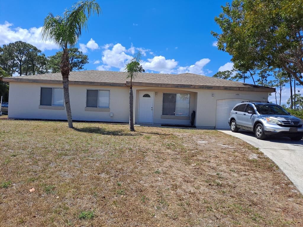 Photo of 1486 SE Buckingham Terrace, Port Saint Lucie, FL 34952 (MLS # R10707969)