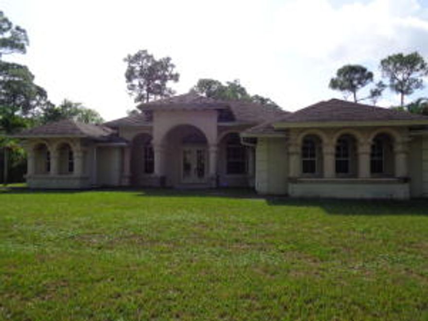 NICE 3 BED 3 BATH CBS HOME ON A 1+ ACRE LOT.  CLOSE TO ROYAL PALM BEACH.  
**MULTIPLE OFFERS RECEIVED.  H&B DEADLINE IS 12-24  6PM**
**Employees and family members residing with employees of JPMorgan Chase Bank, N.A., its affiliates or subsidiaries are strictly prohibited from directly or indirectly purchasing any property owned by JPMorgan Chase Bank, N.A**