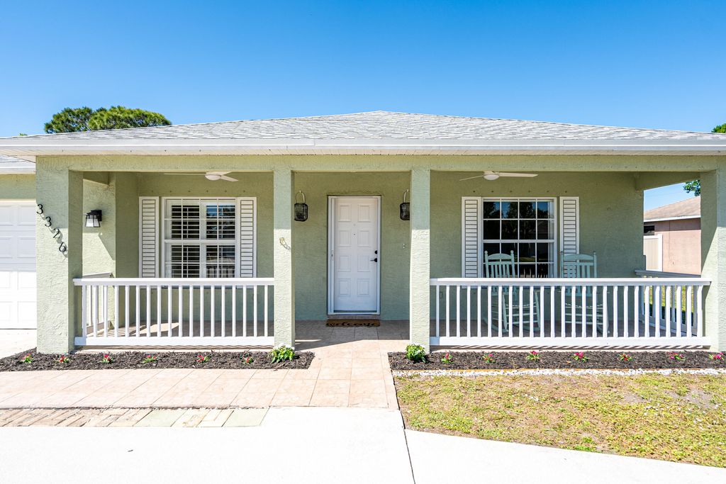 Photo of 3326 SW Martin Street, Port Saint Lucie, FL 34953 (MLS # R11070999)