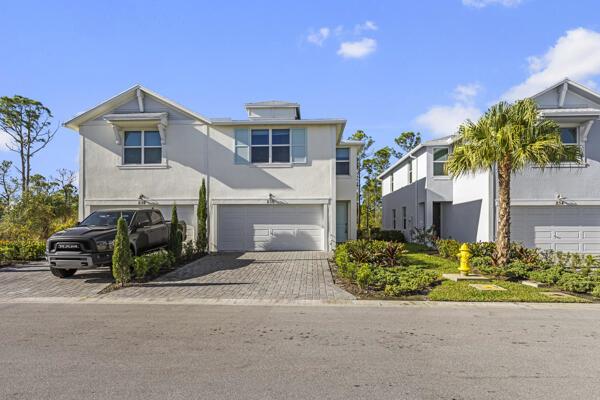This light filled townhouse boasts a fantastic location with a charming exterior and a bright, open floor plan. Enjoy the peaceful partial lake views and privacy overlooking a serene preserve. The upgraded kitchen features a large island, perfect for both cooking and entertaining. A cozy living room, an upstairs loft, and multiple tranquil bedrooms create the ideal space to relax. Plus, if that's not benefit enough, you're just minutes away from the best that Jensen Beach and Stuart have to offer! Osprey Preserve is an exclusive gated community boasting 87 2-unit townhomes with spacious over size lots and both a resort-style pool and cabana, offering a true retreat. Make this exceptional townhouse your personal sanctuary, and inquire today!