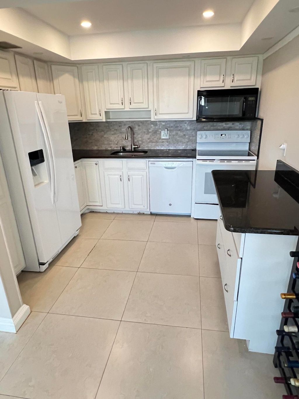 Photo of 413 Greenbrier A Cir, West Palm Beach, FL 33417 (MLS # B26007775)