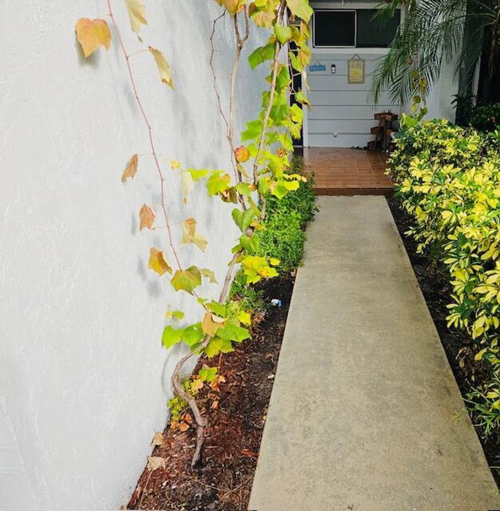 Photo of 1695 Woodbridge Lakes Circle, West Palm Beach, FL 33406 (MLS # R10946241)