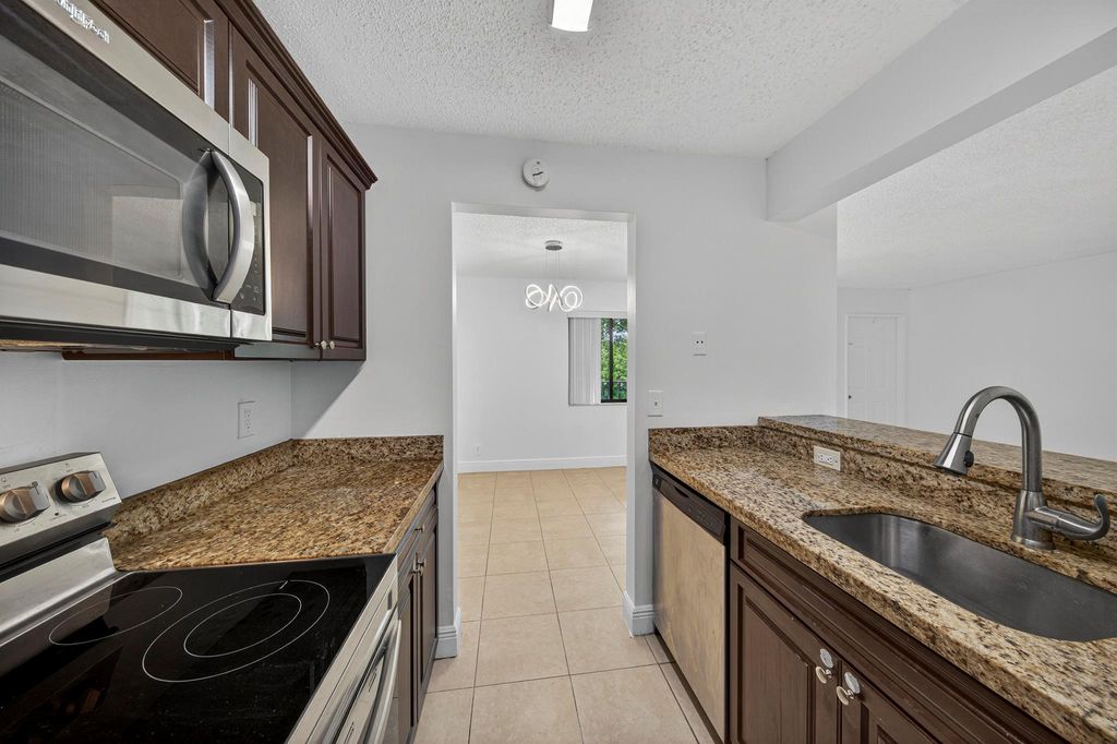 Photo of 913 Meadows Circle, Boynton Beach, FL 33436 (MLS # R11112799)