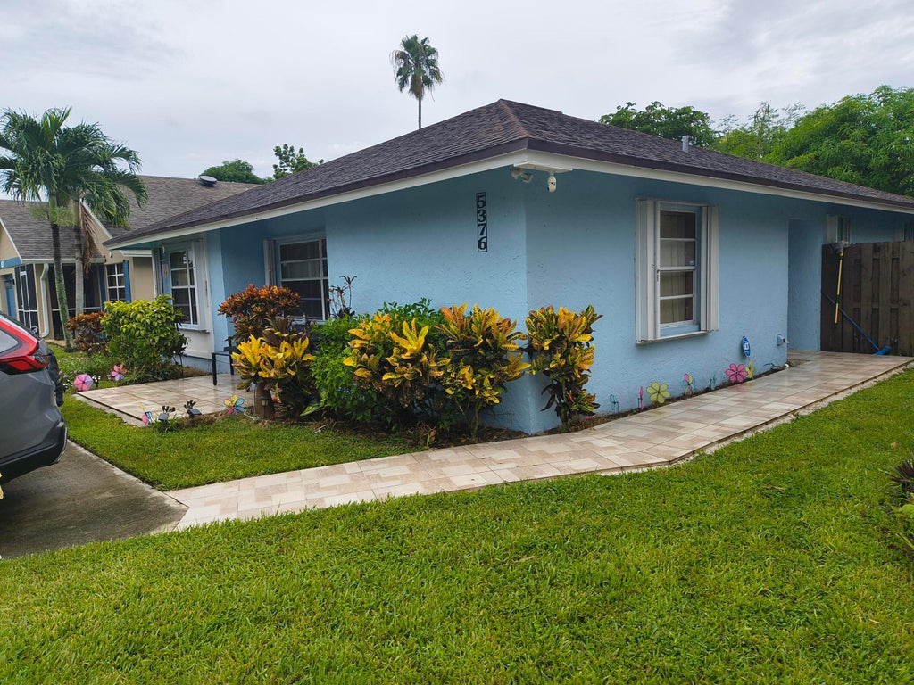 Photo of 5376 GENE Circle, West Palm Beach, FL 33415 (MLS # B26072474)