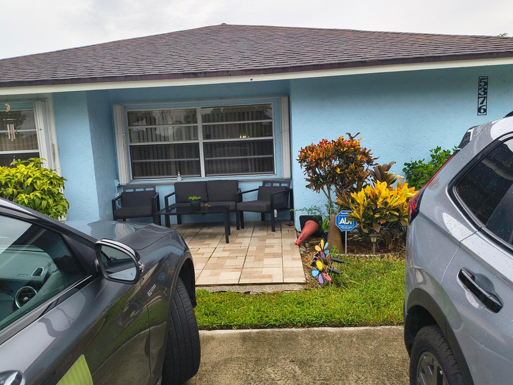 Photo of 5376 GENE Circle, West Palm Beach, FL 33415 (MLS # B26072474)