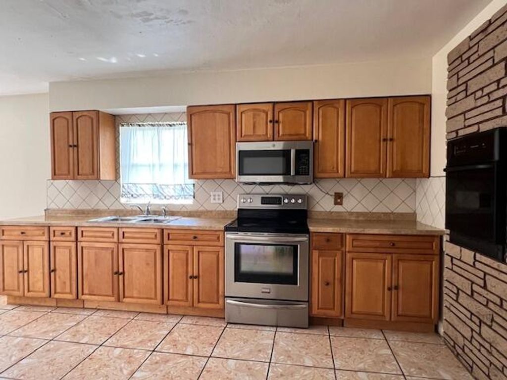 Photo of 1789 Bacom Point Road, Pahokee, FL 33476 (MLS # B26016706)