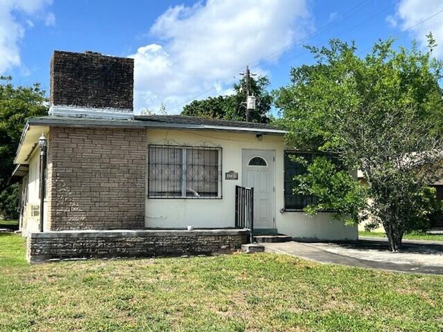 Charming 3-bedroom, 1-bath home on the outskirts of Lake Okeechobee offering an open floor plan, indoor laundry, a cozy wood-burning fireplace, a small office area, fruit trees, and a 2-car carport. Offers added backyard privacy with no neighbors behind.