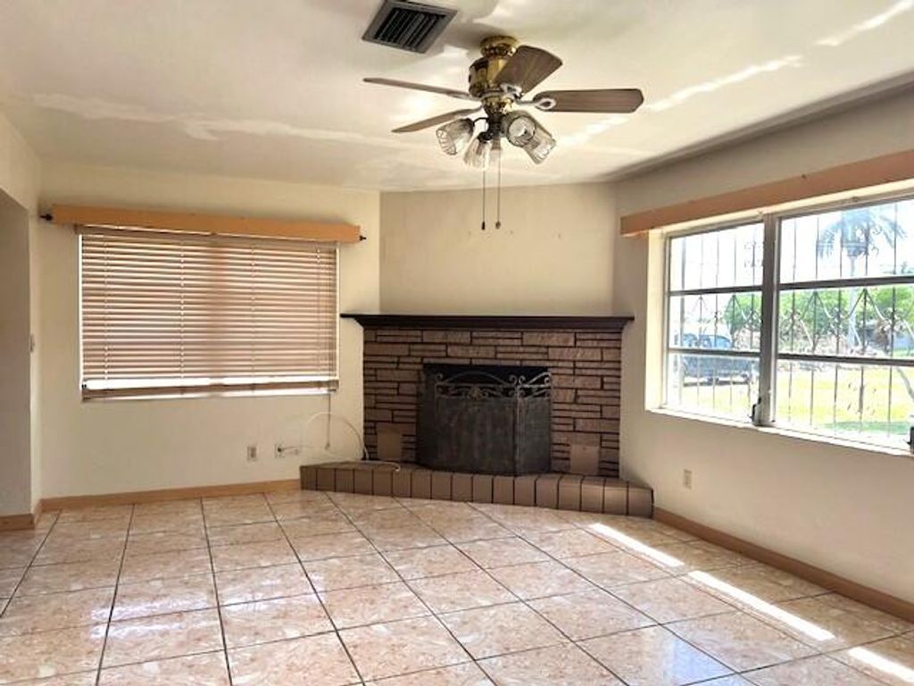 Photo of 1789 Bacom Point Road, Pahokee, FL 33476 (MLS # B26016706)