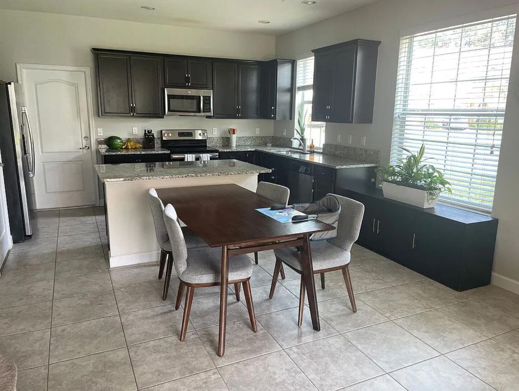 Photo of 9727 SW Purple Martin Way, Stuart, FL 34997 (MLS # R10901787)